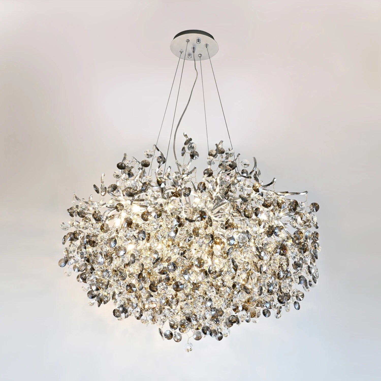 Lightigious Smoked Grey Crystal Chandelier warm glow lifestyle room shot