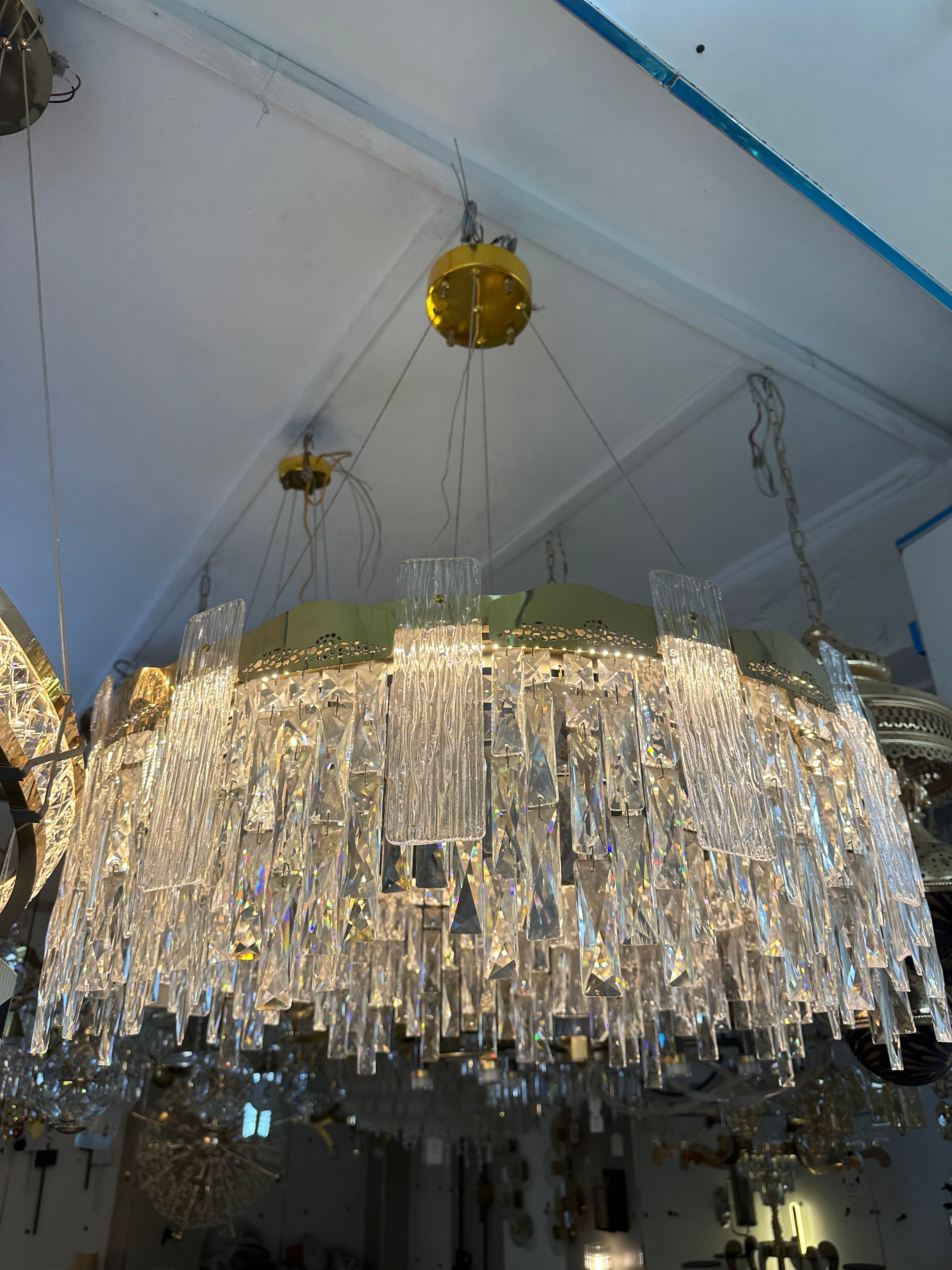 Lightigious Aurora Luxe Crystal Ring Chandelier installed luxury living room
