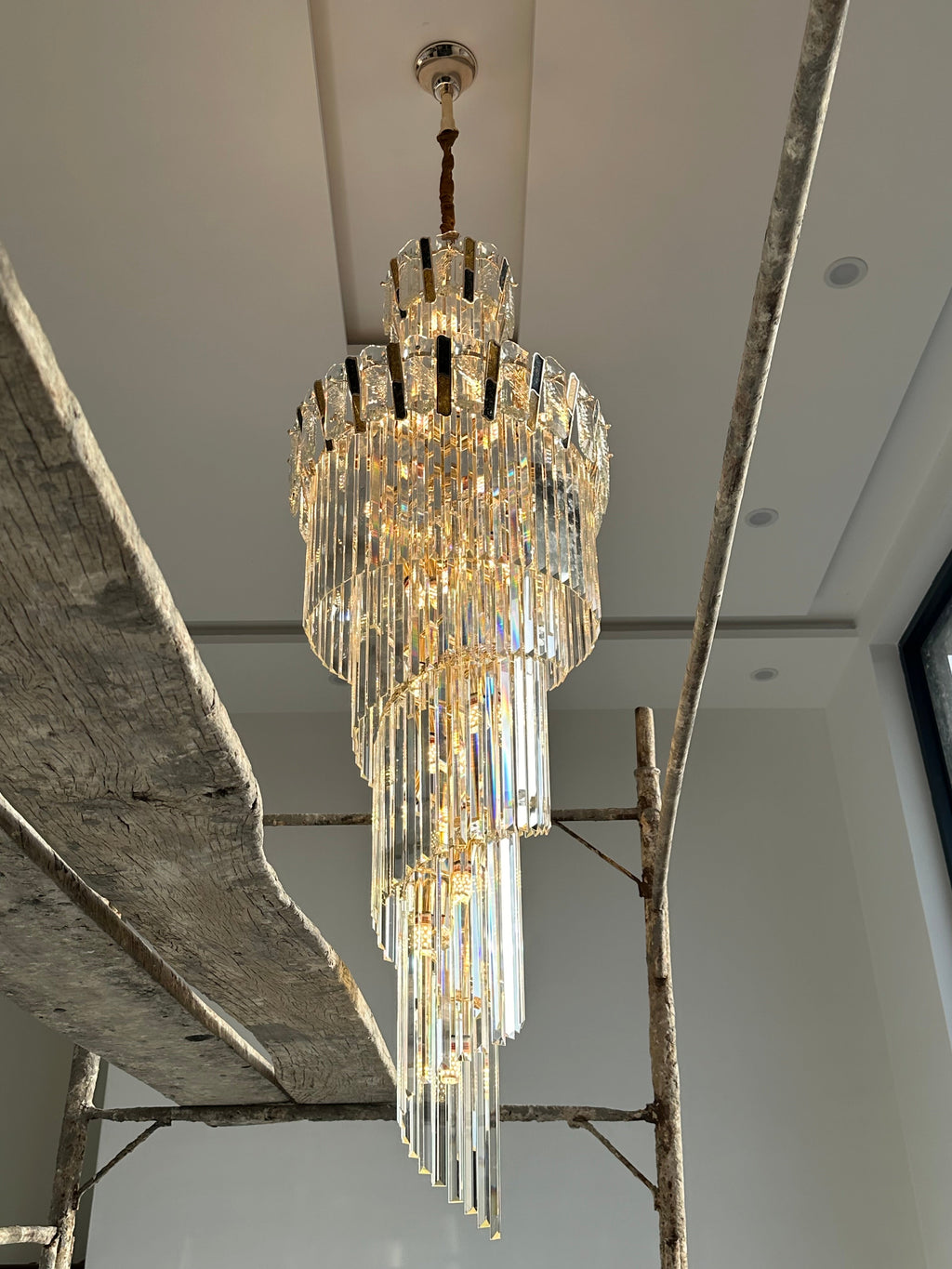 Lightigious Stair Crystal Chandelier warm glow double height staircase